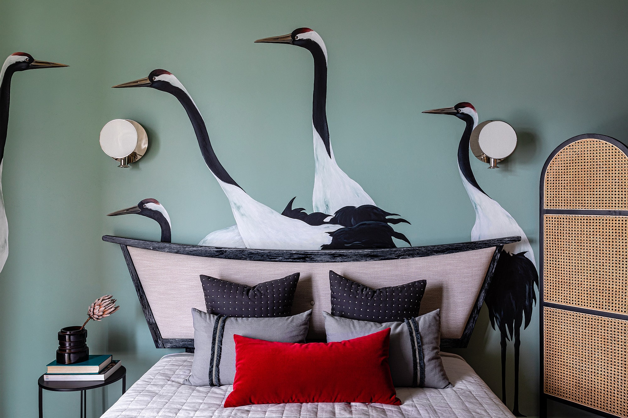 bedroom with beautiful art with birds on the wall