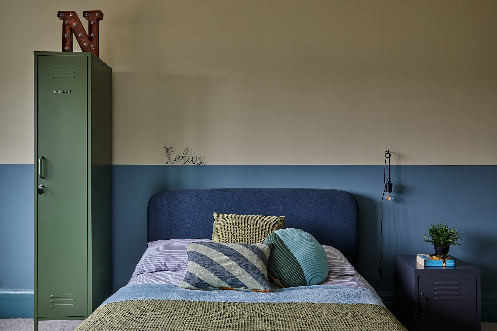 boy's bedroom with olive and blue walls