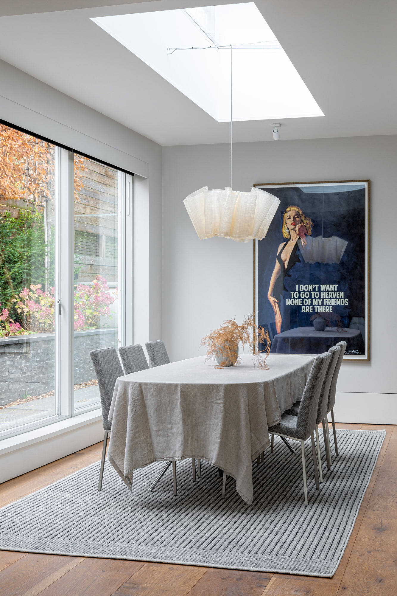 dining table, hanging light, poster 