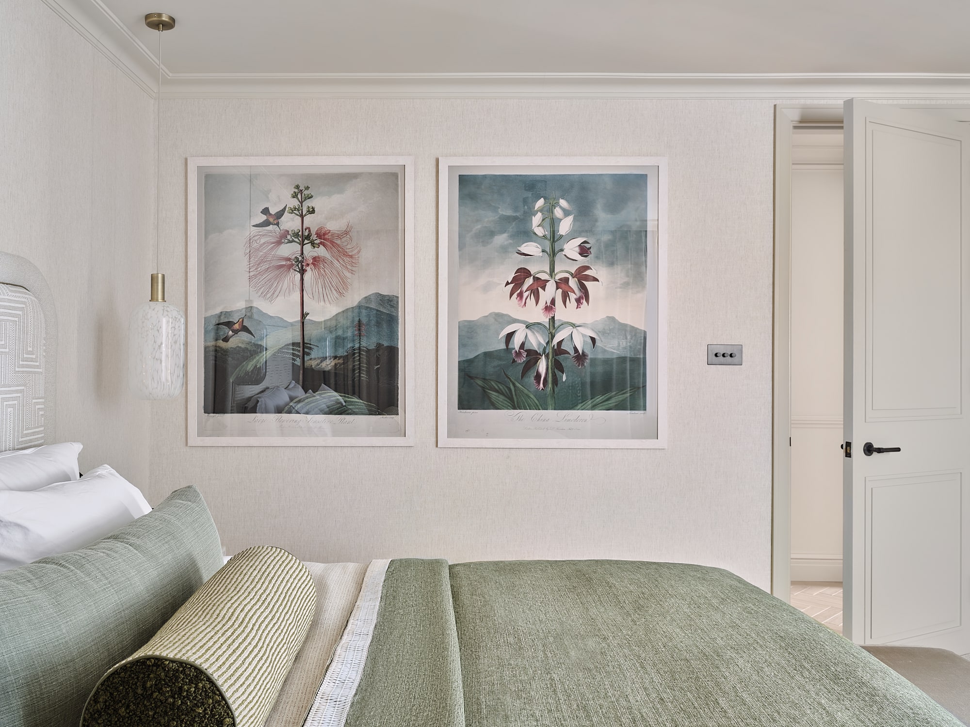interior photo of a master bedroom, wall with posters
